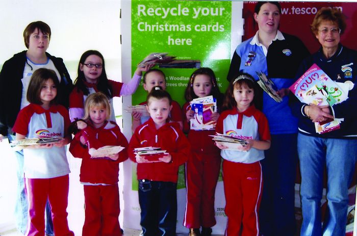 1099_1004.jpg St Peters Rainbows, seen at Tescos collecting point with their Christmas cards, L-R: Katie Emmanuel (assistant), Gabbie, Megan (front), Malana (behi
