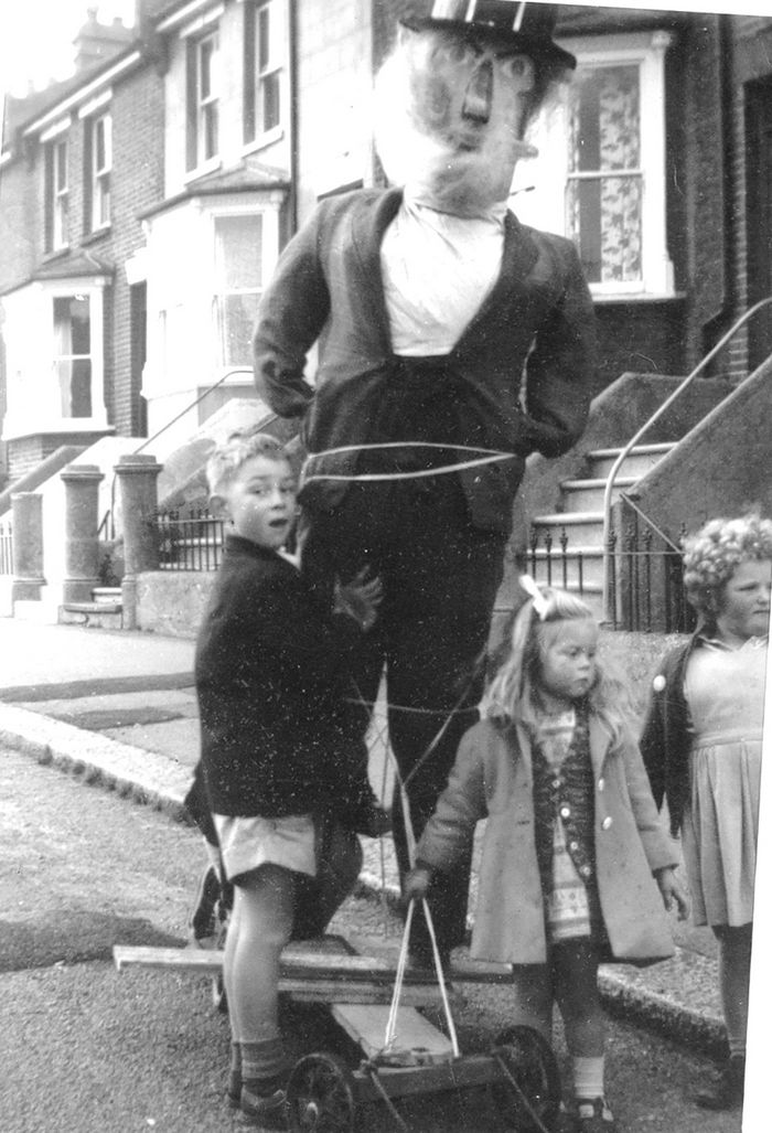 433_576 An enormous Guy Fawkes, made by Vic for his children. It is fixed to a go cart for touring round the streets, eventually to be burnt on the allotments