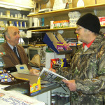 Terry Foord and customer Roger Williams